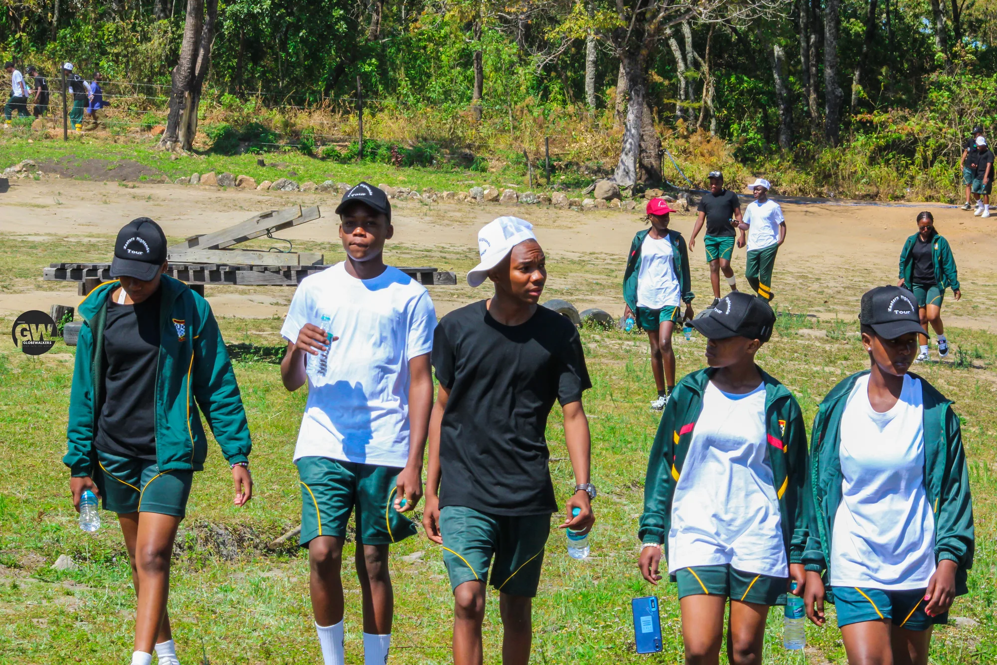 Young travellers walking between activities on the Eastern Highlands Tour, Manicaland, August 2025